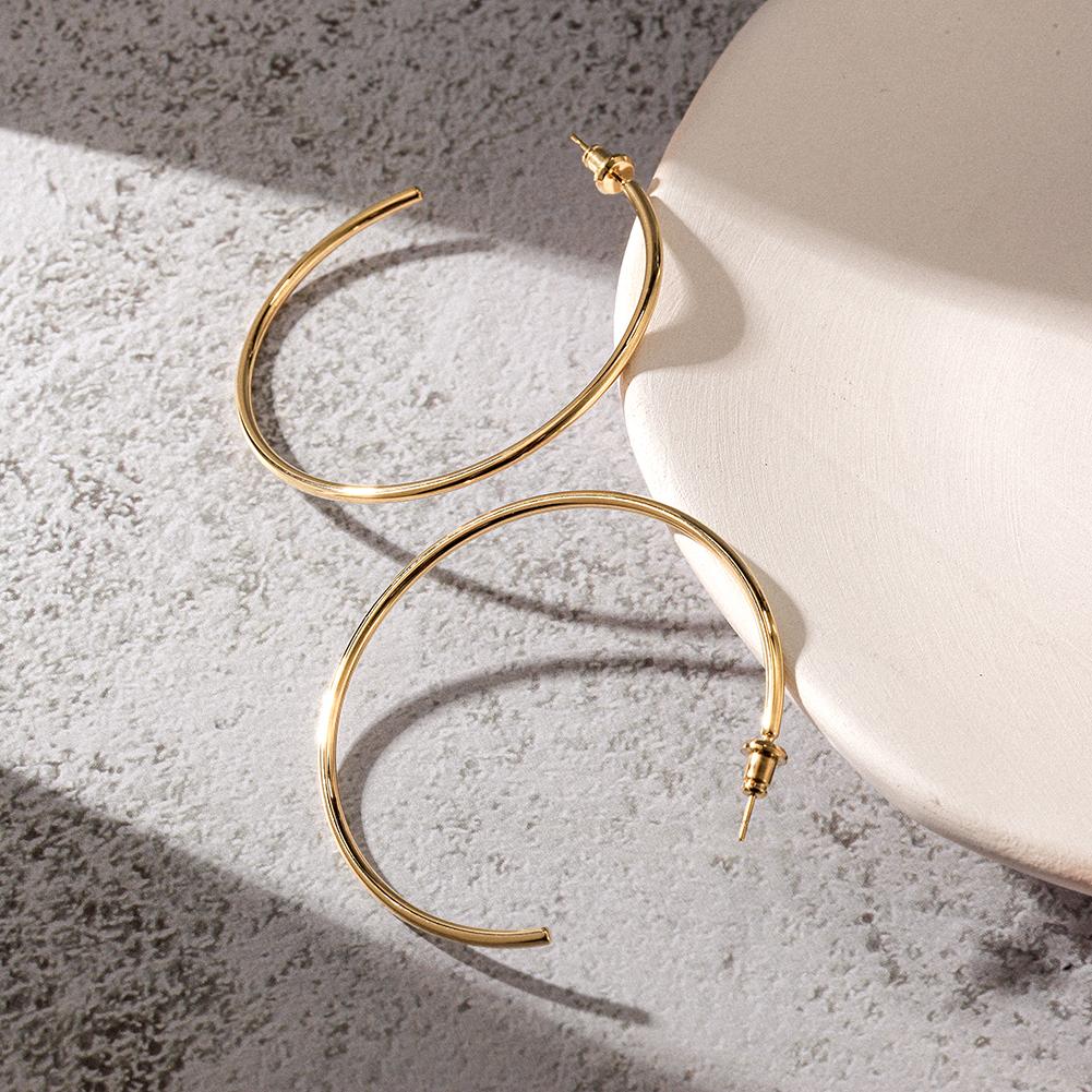 A pair of elegant KLO hoop earrings made from stainless steel, showcasing a sleek and stylish design suitable for everyday wear.