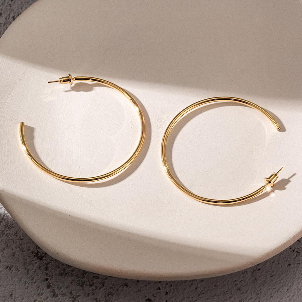 A pair of elegant KLO hoop earrings made from stainless steel, showcasing a sleek and stylish design suitable for everyday wear.