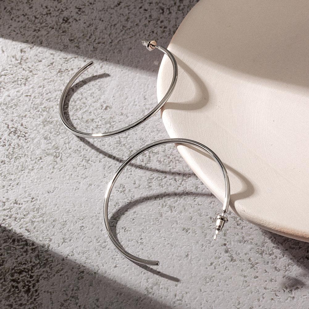 A pair of elegant KLO hoop earrings made from stainless steel, showcasing a sleek and stylish design suitable for everyday wear.