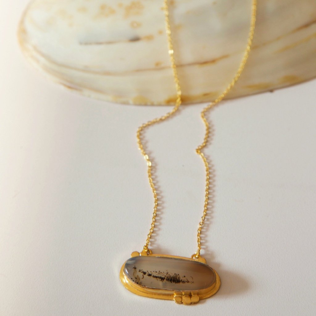 Kyoto Winter Dendritic Agate Pendant showcasing unique marbling and 18K gold accents, perfect for elegant jewelry lovers.