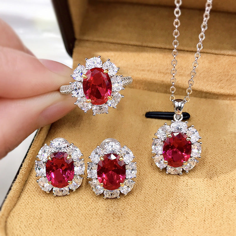 Elegant lab created ruby necklace in 925 sterling silver with cubic zirconia accents, showcasing a vibrant ruby pendant.