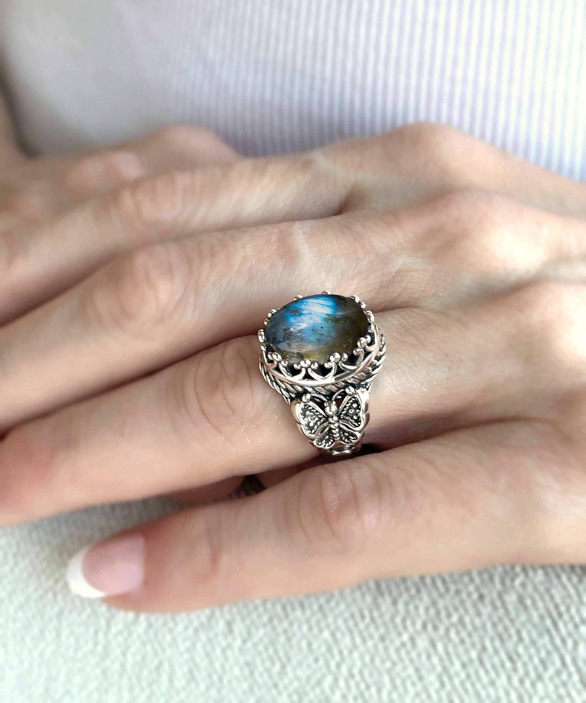 Elegant Labradorite Gemstone Filigree Art Double Butterfly Ring made of 925 sterling silver with intricate detailing.