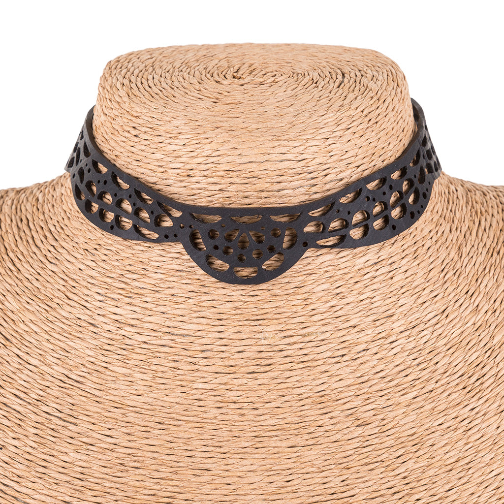 Lace Vegan Inner Tube Choker made from recycled rubber, featuring intricate lace-like patterns and adjustable button clasps.