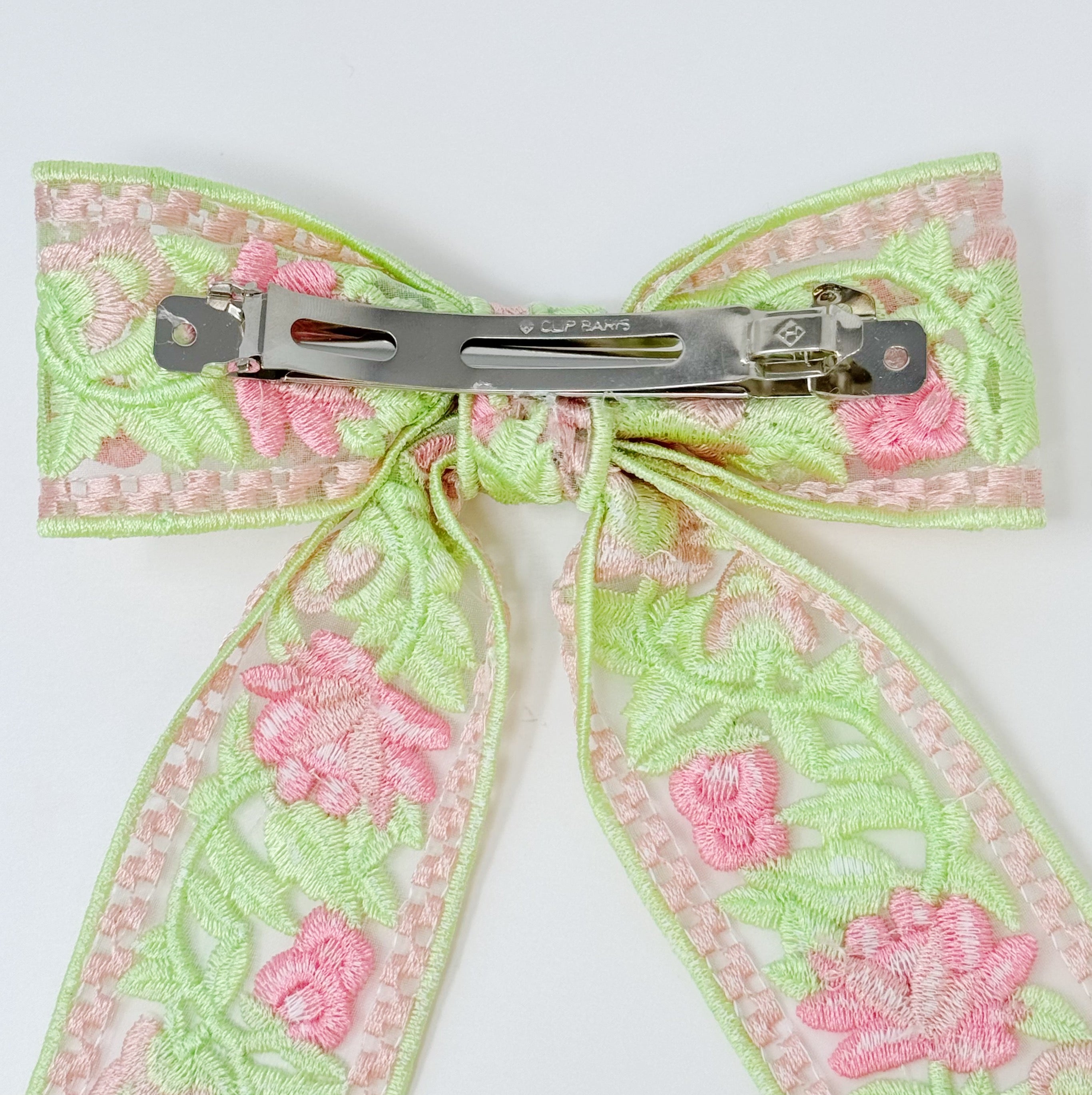 Lacey Flower Embroidered Bow Hair Clip featuring intricate floral design and delicate lace, perfect for elegant hairstyles.