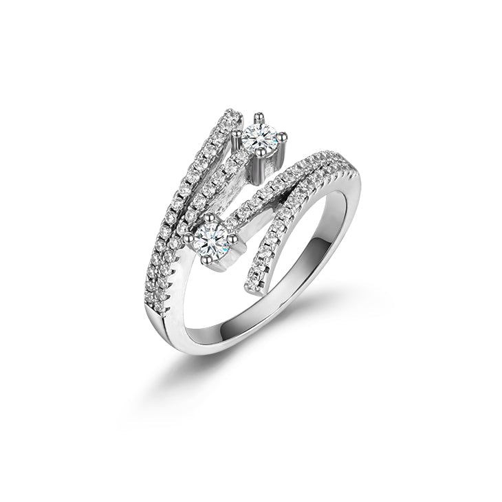 Lachouette Cross Open Sterling Silver Ring featuring a white sapphire, elegantly designed with a real white gold finish.