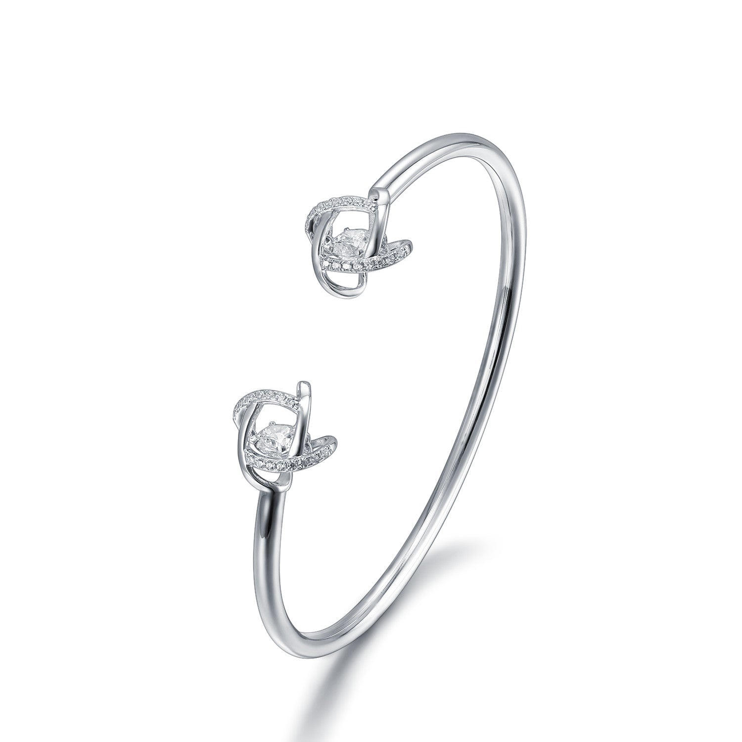 Lachouette 'Never Apart' bangles made of 925 sterling silver with white gold finish and white sapphire stones, showcasing elegance and durability.