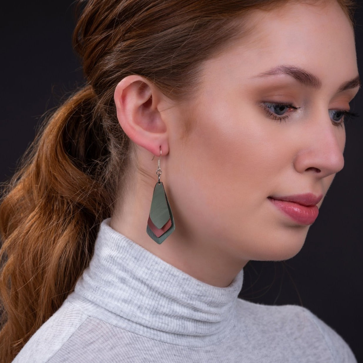 Colorful Lantern Eco Friendly Rubber Earrings in a multi-layered kite shape, handcrafted from recycled rubber with stainless steel hooks.