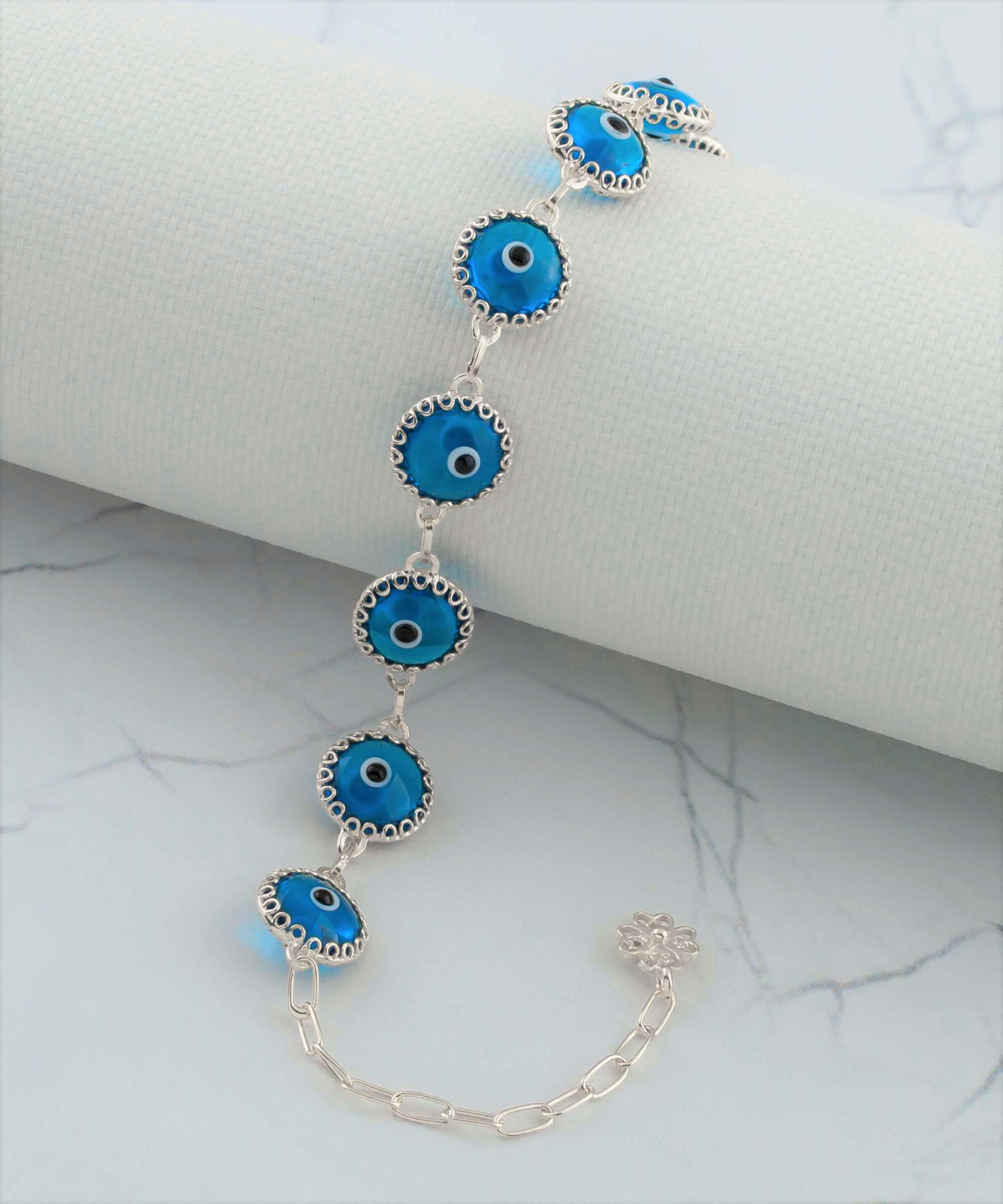 Lapis Blue Evil Eye Sterling Silver Adjustable Link Bracelet featuring a strong rolo chain and protective evil eye design.