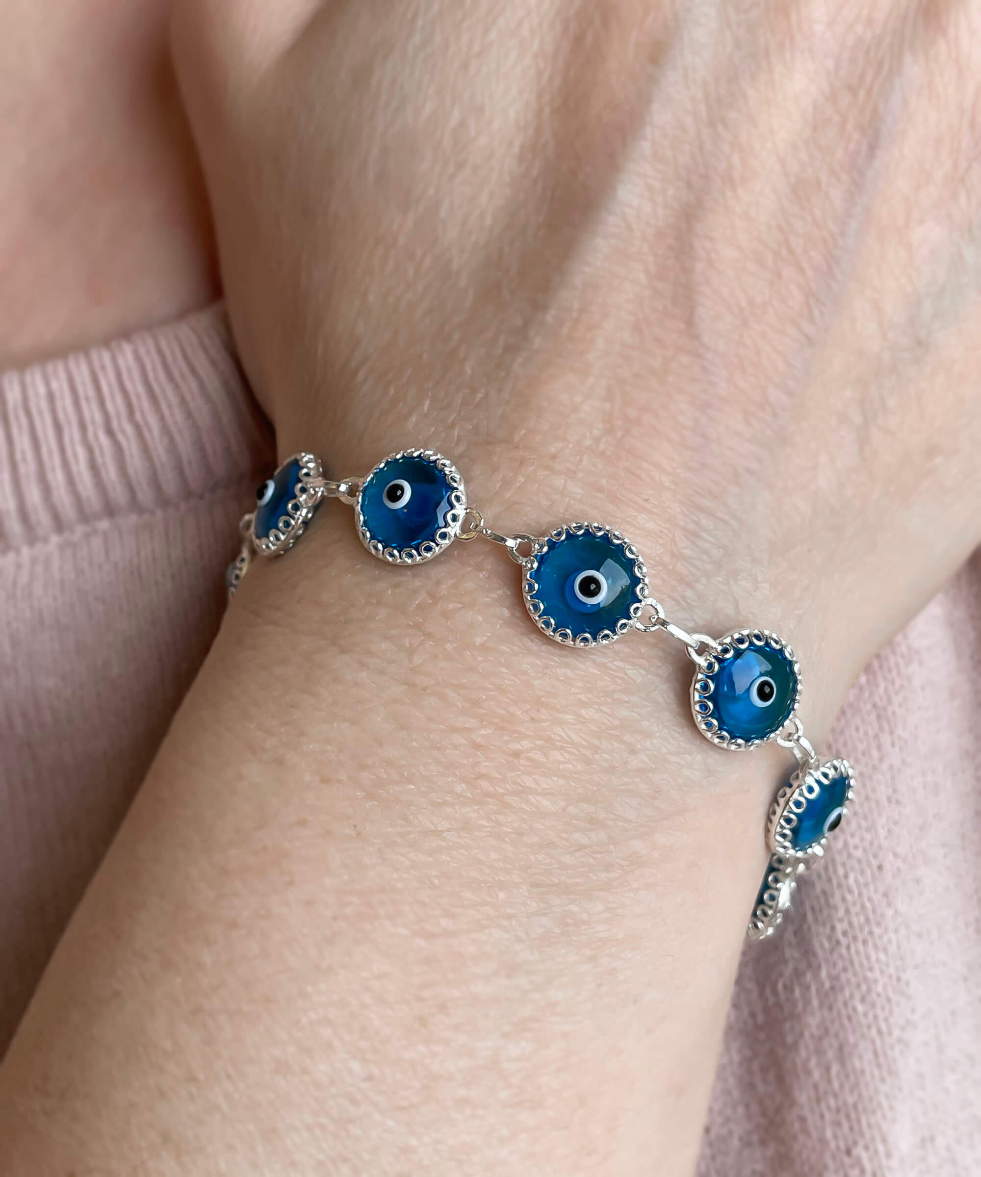 Lapis Blue Evil Eye Sterling Silver Adjustable Link Bracelet featuring a strong rolo chain and protective evil eye design.