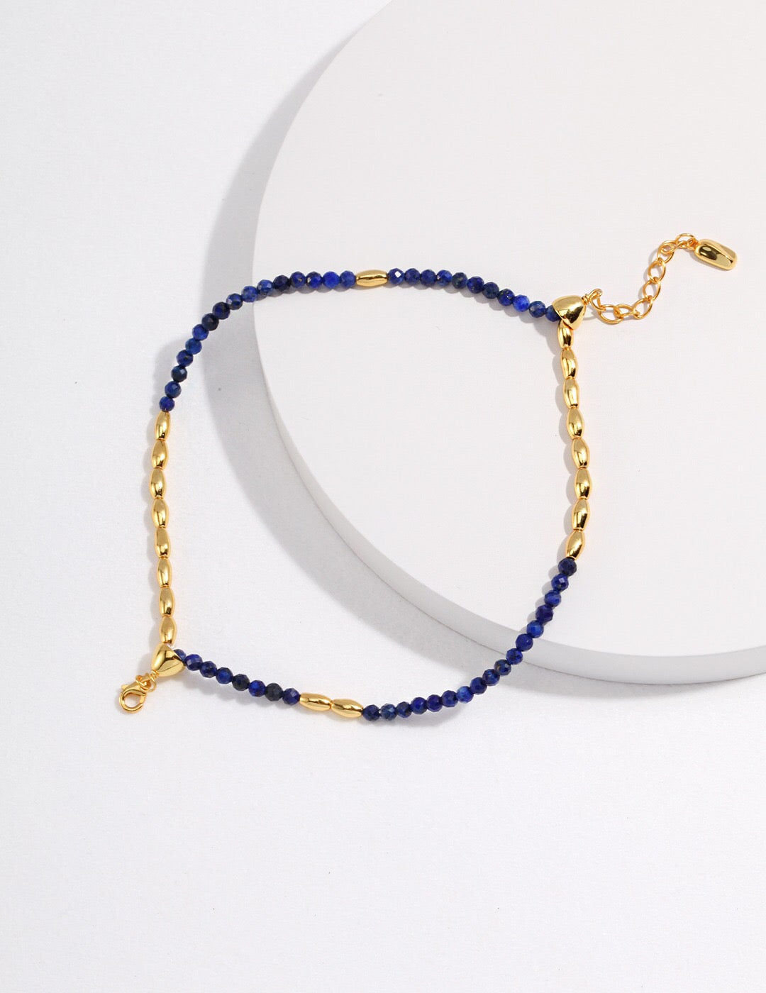 Handmade Lapis Lazuli Beaded Bracelet with gold vermeil accents, showcasing deep blue beads and elegant design.