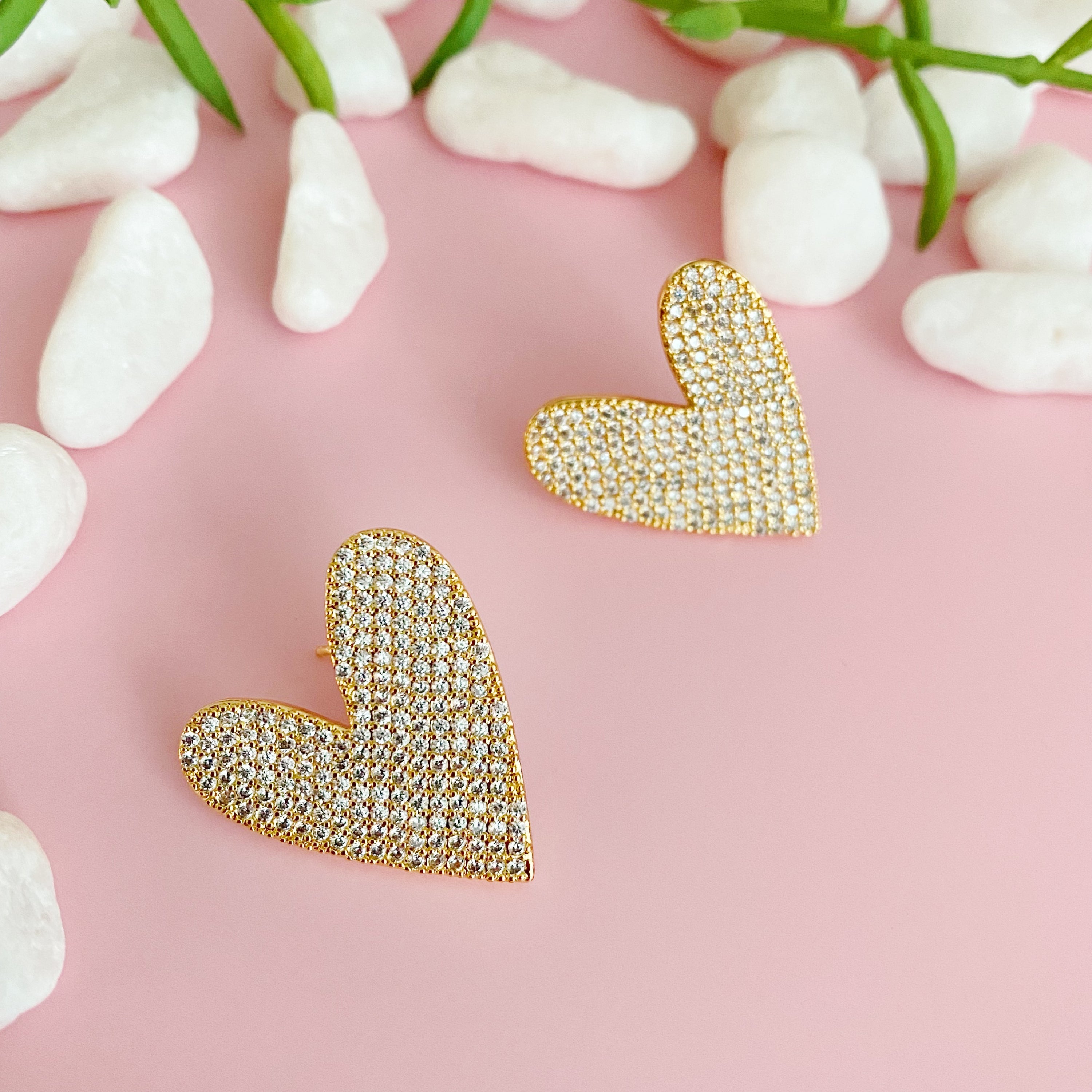 Lara Land Heart Earrings featuring sparkling cubic zirconia in a charming heart shape, crafted from plated brass.