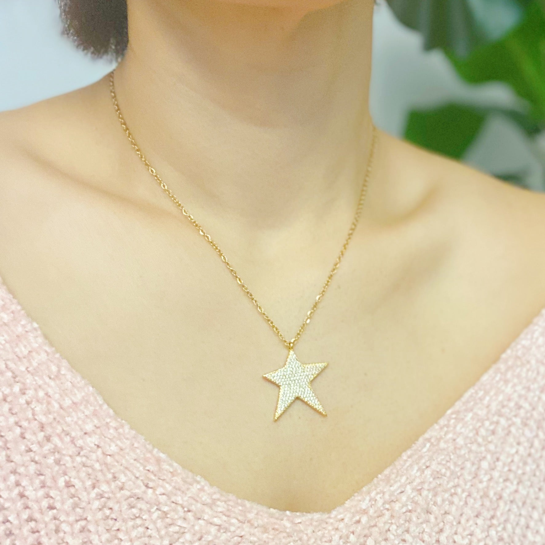 Lara Land Shiny Star Necklace featuring a star-shaped pendant adorned with cubic zirconia on a stainless steel chain.