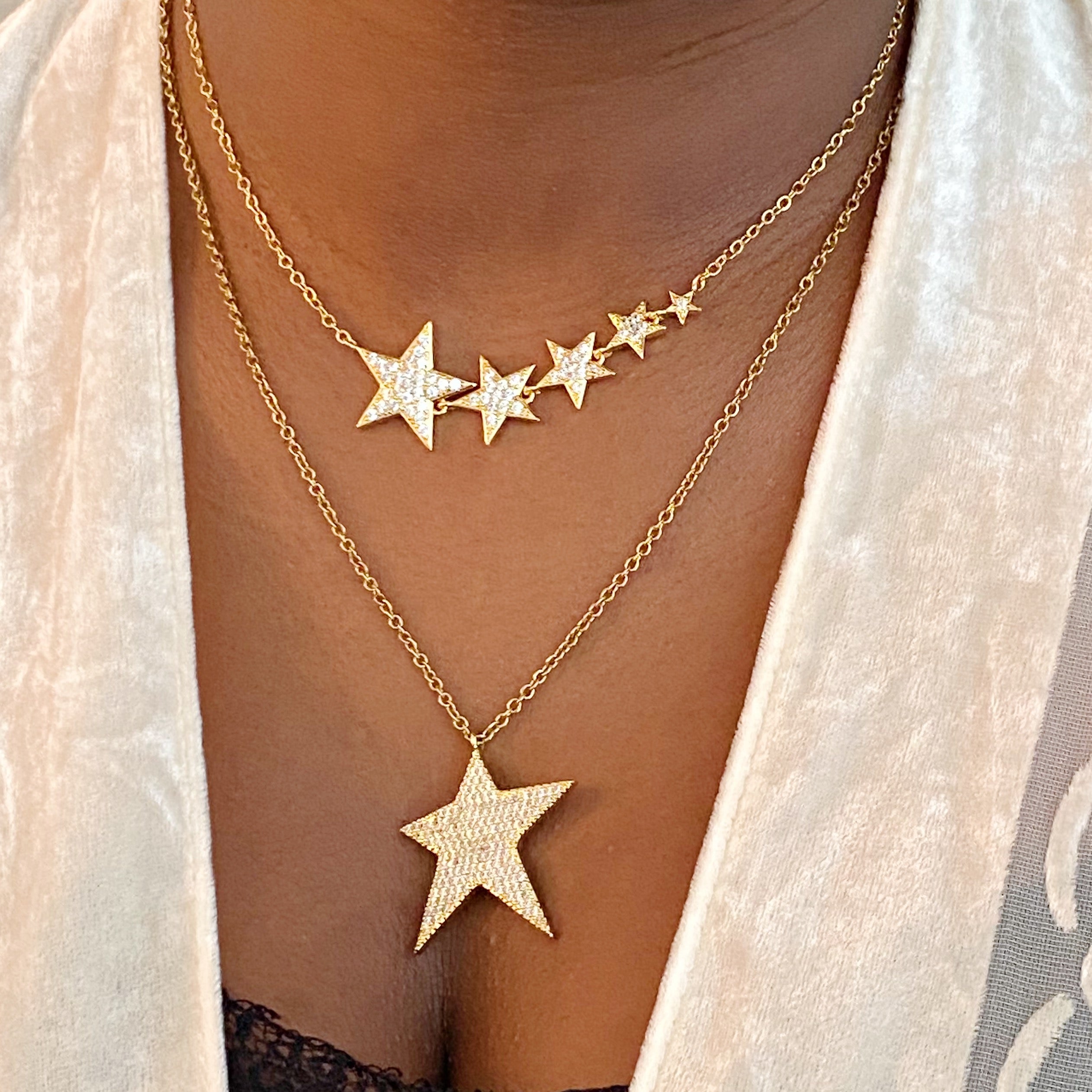 Lara Land Shiny Star Necklace featuring a star-shaped pendant adorned with cubic zirconia on a stainless steel chain.