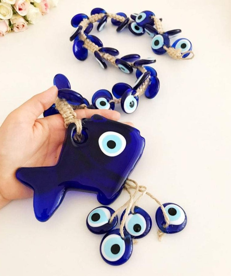 Large evil eye lucky fish wall hanging with 41 beads, featuring a big fish bead and multiple smaller glass beads, showcasing vibrant colors and intricate designs.