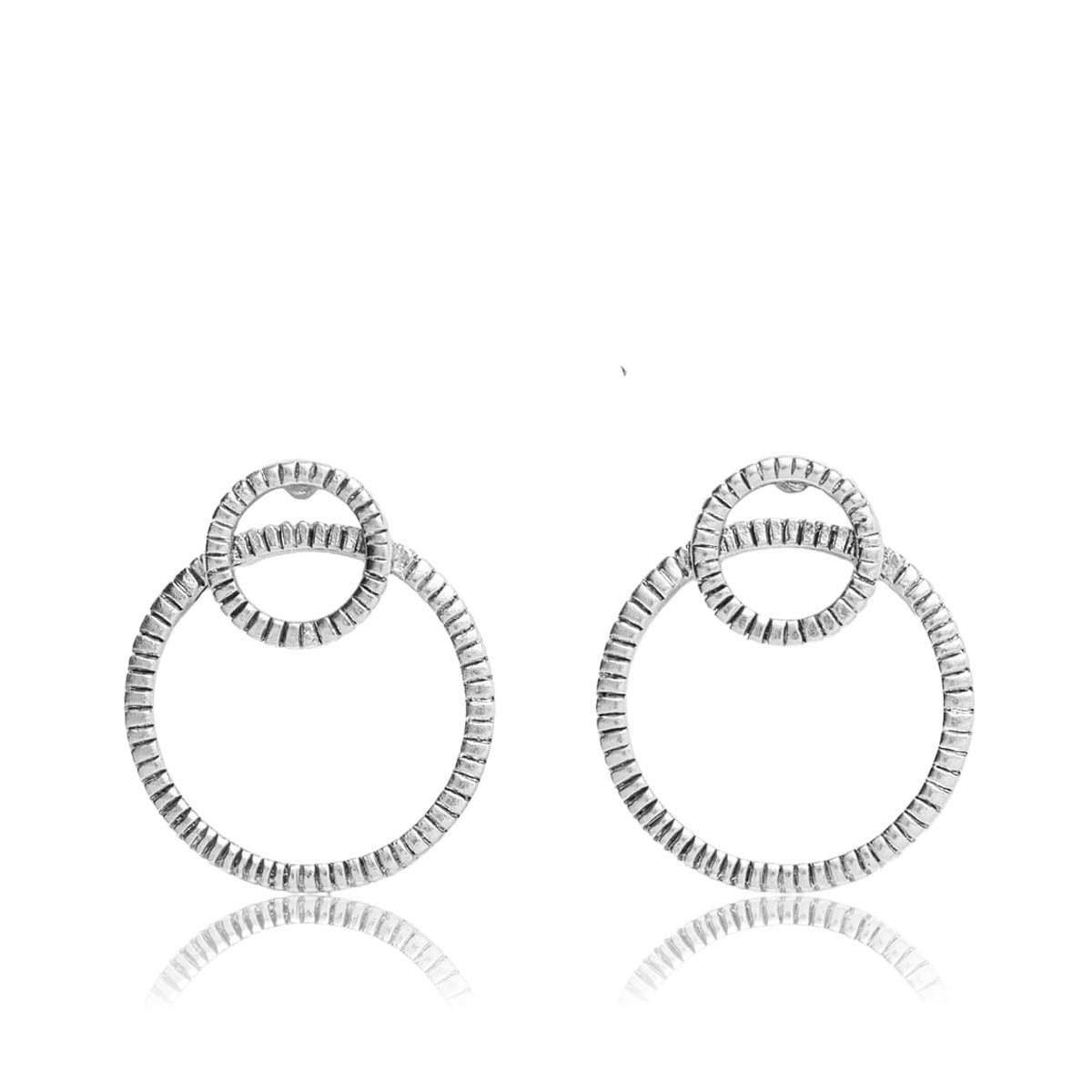 Large Frontal Circle Earrings featuring overlapping rings with an antique finish, available in gold and silver.