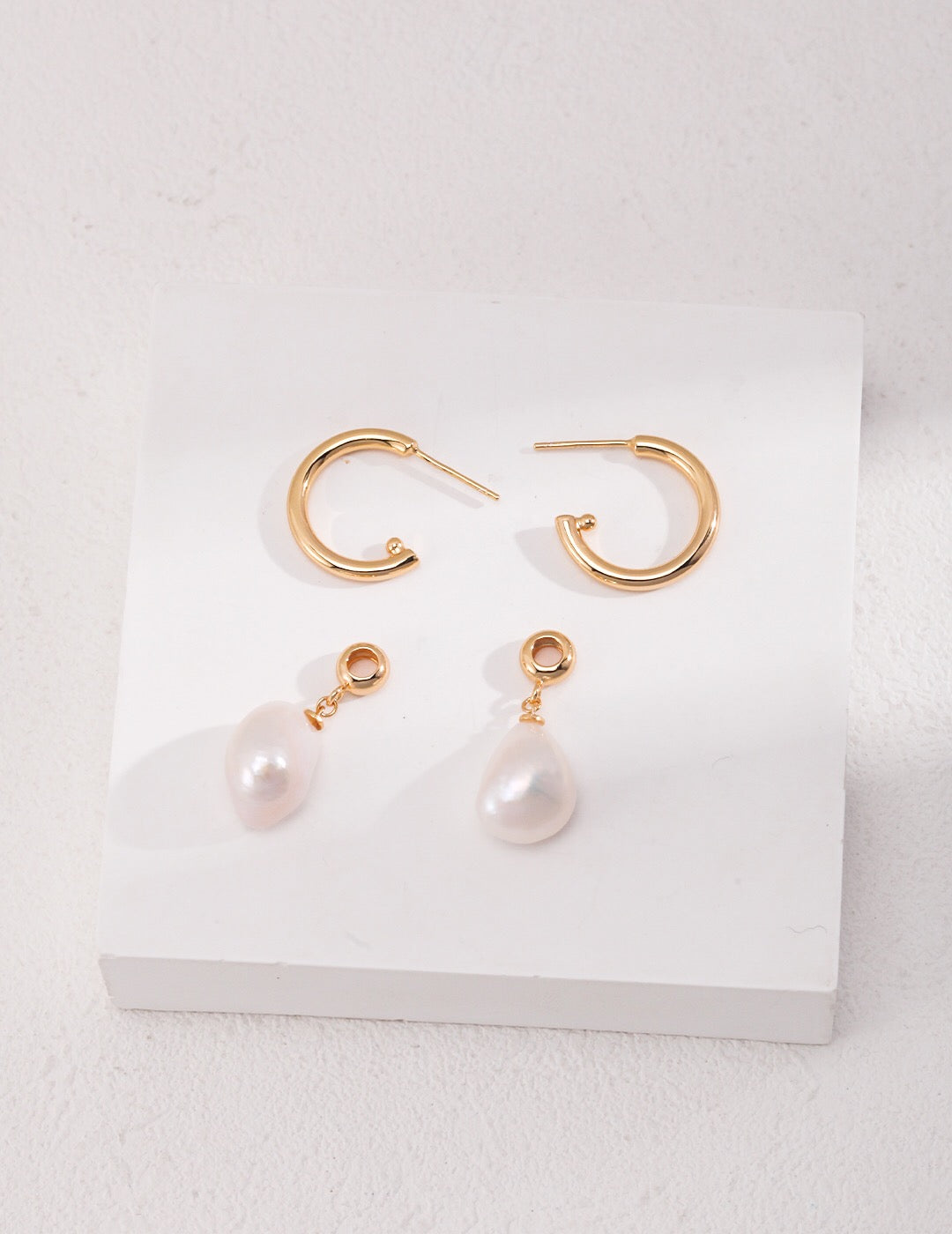 Large Pearl Drop Hoop Earrings featuring natural freshwater pearls and gold vermeil, elegantly designed for a luxurious look.