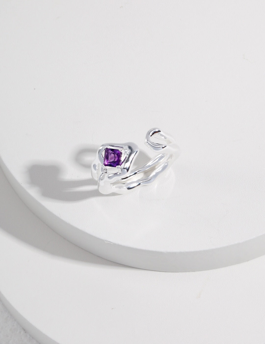 A stunning Lava Fluid Design Amethyst Ring featuring a 4mm amethyst stone set in tarnish-resistant sterling silver and gold vermeil.