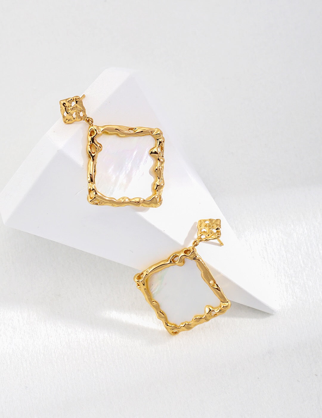 Elegant Lava Shaped Square Mother Of Pearl Earrings with gold vermeil finish, showcasing unique iridescent patterns.