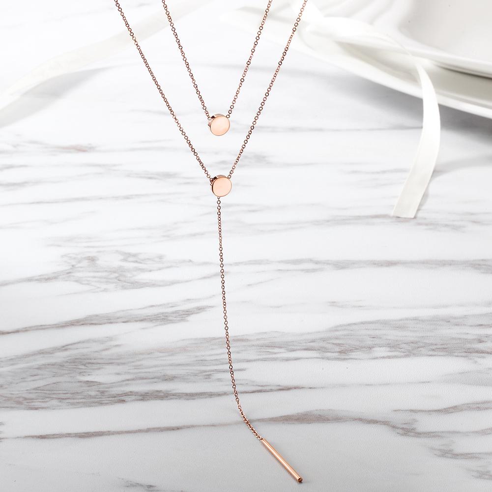 A stylish Layered Lariat Necklace made from 316L surgical stainless steel with 14K gold PVD plating, showcasing its elegant layered design.