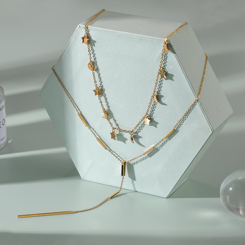 Layered Necklace Set featuring a delicate star and moon design with a Y necklace, elegantly displayed in a gift box.