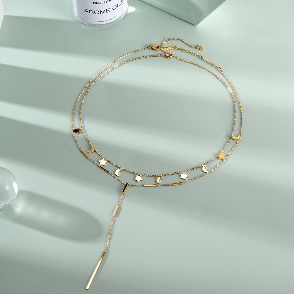 Layered Necklace Set featuring a delicate star and moon design with a Y necklace, elegantly displayed in a gift box.