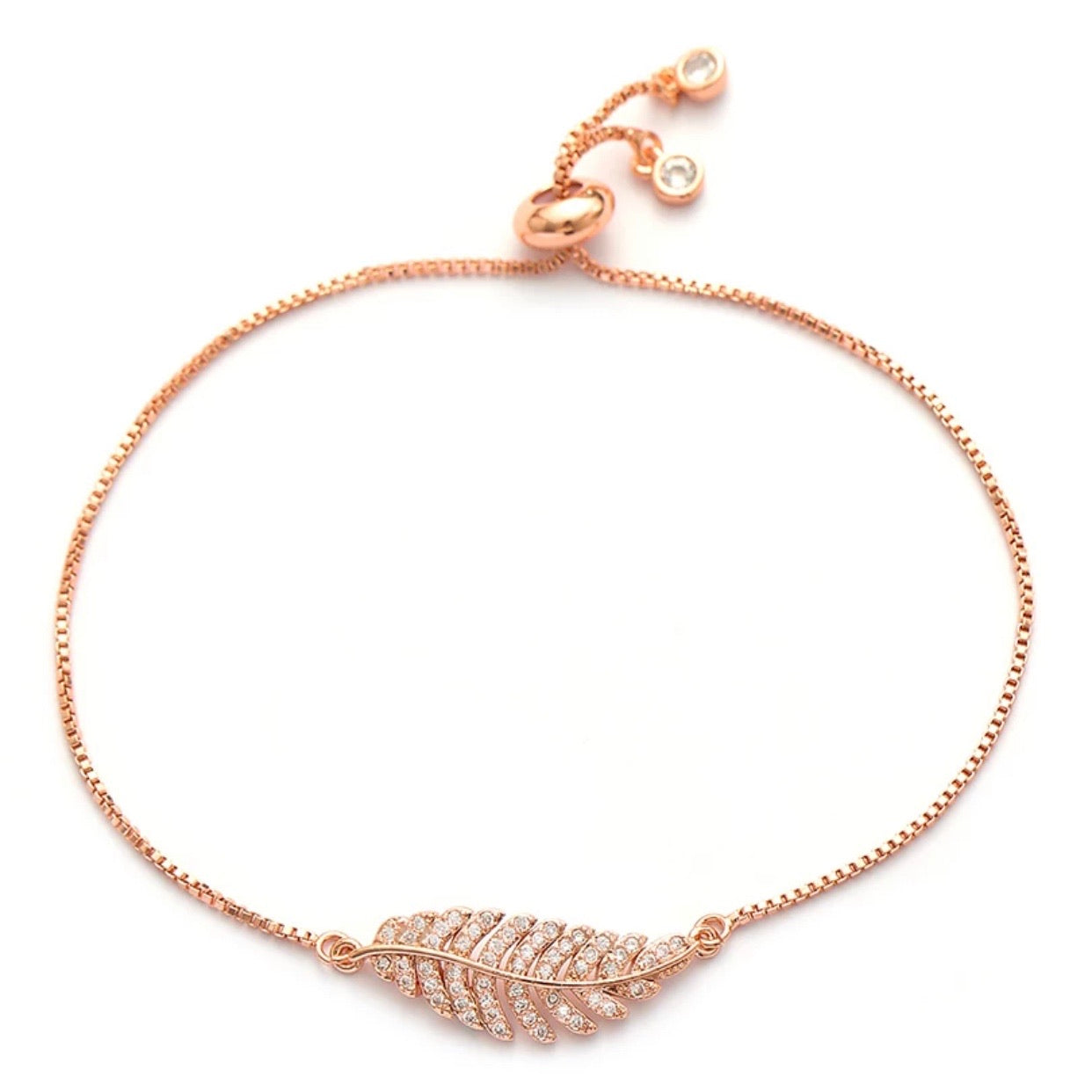 A stylish Leaf Adjustable Bracelet in gold, featuring a delicate leaf design, adjustable to fit any wrist size.