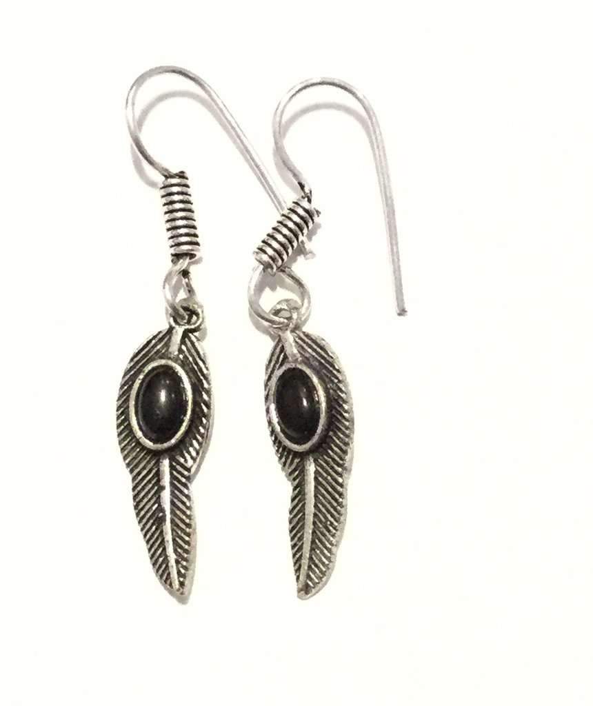 Elegant Leaf Dangling Earrings handmade in England, featuring a beautiful design with hypoallergenic materials.