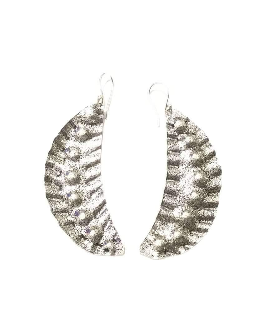 Elegant Leaf Statement Earrings in brass with intricate tribal design, available in gold and silver.