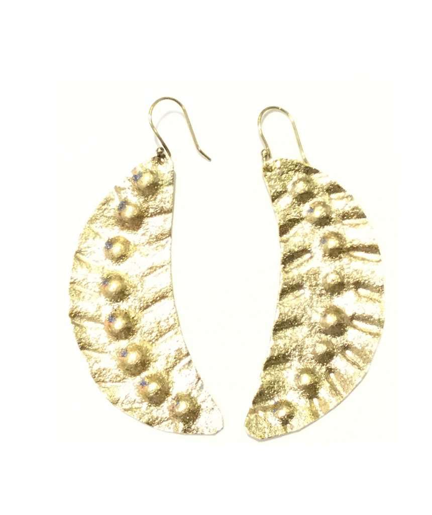 Elegant Leaf Statement Earrings in brass with intricate tribal design, available in gold and silver.