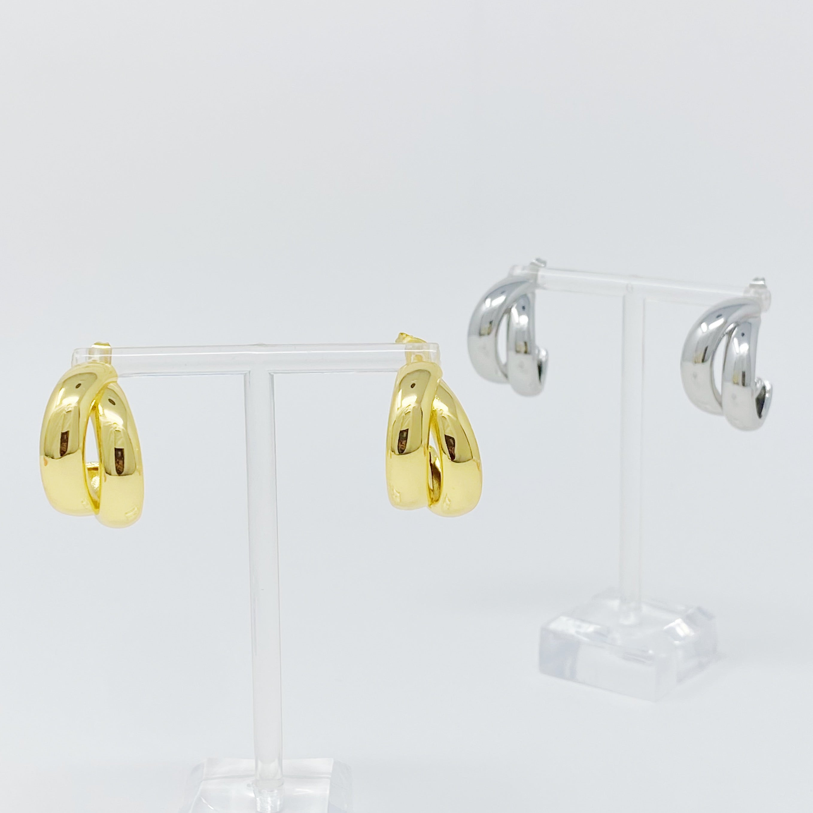 Stylish Lean On Me Hoop Earrings in 18K Gold or Rhodium plated brass, showcasing a chic and edgy design.