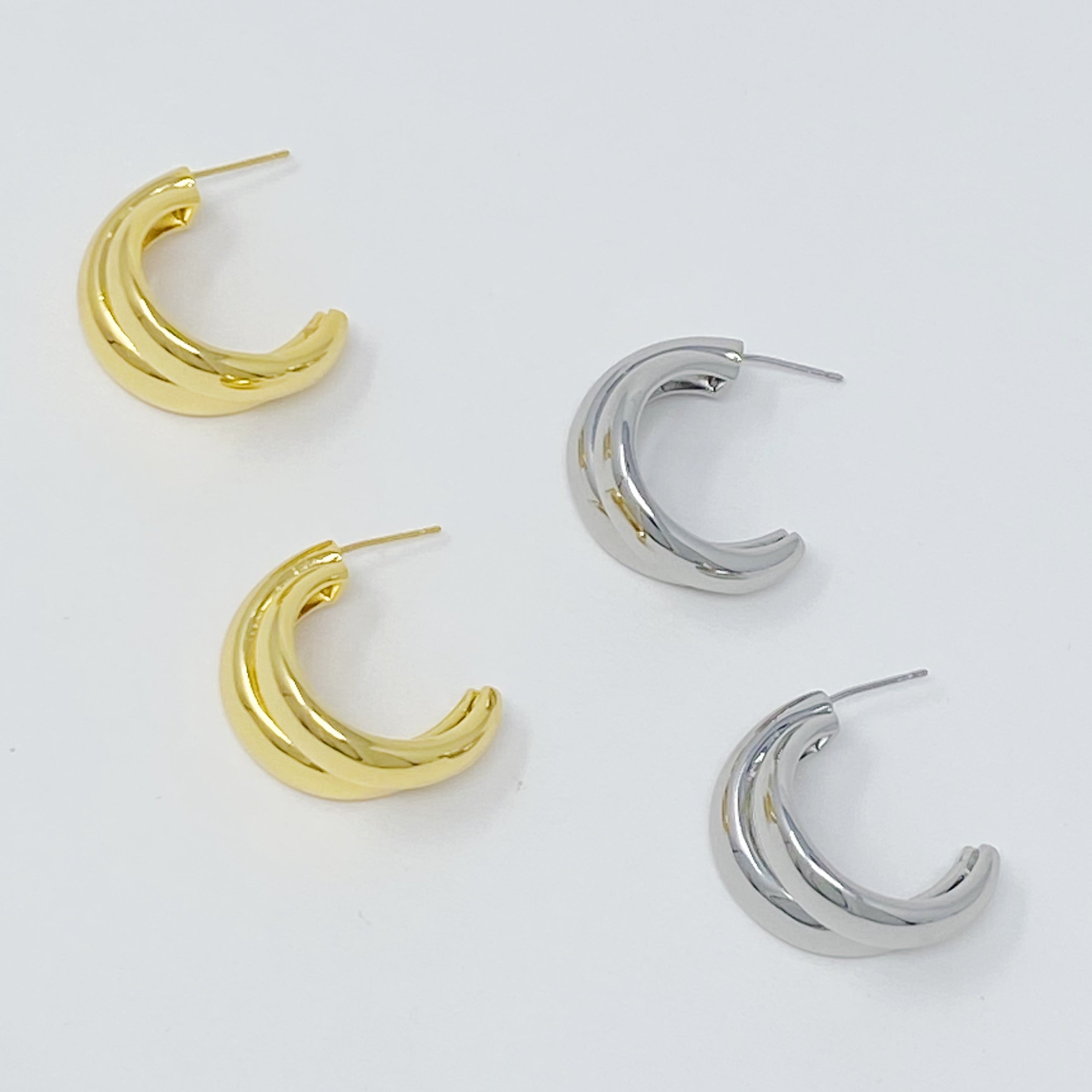 Stylish Lean On Me Hoop Earrings in 18K Gold or Rhodium plated brass, showcasing a chic and edgy design.