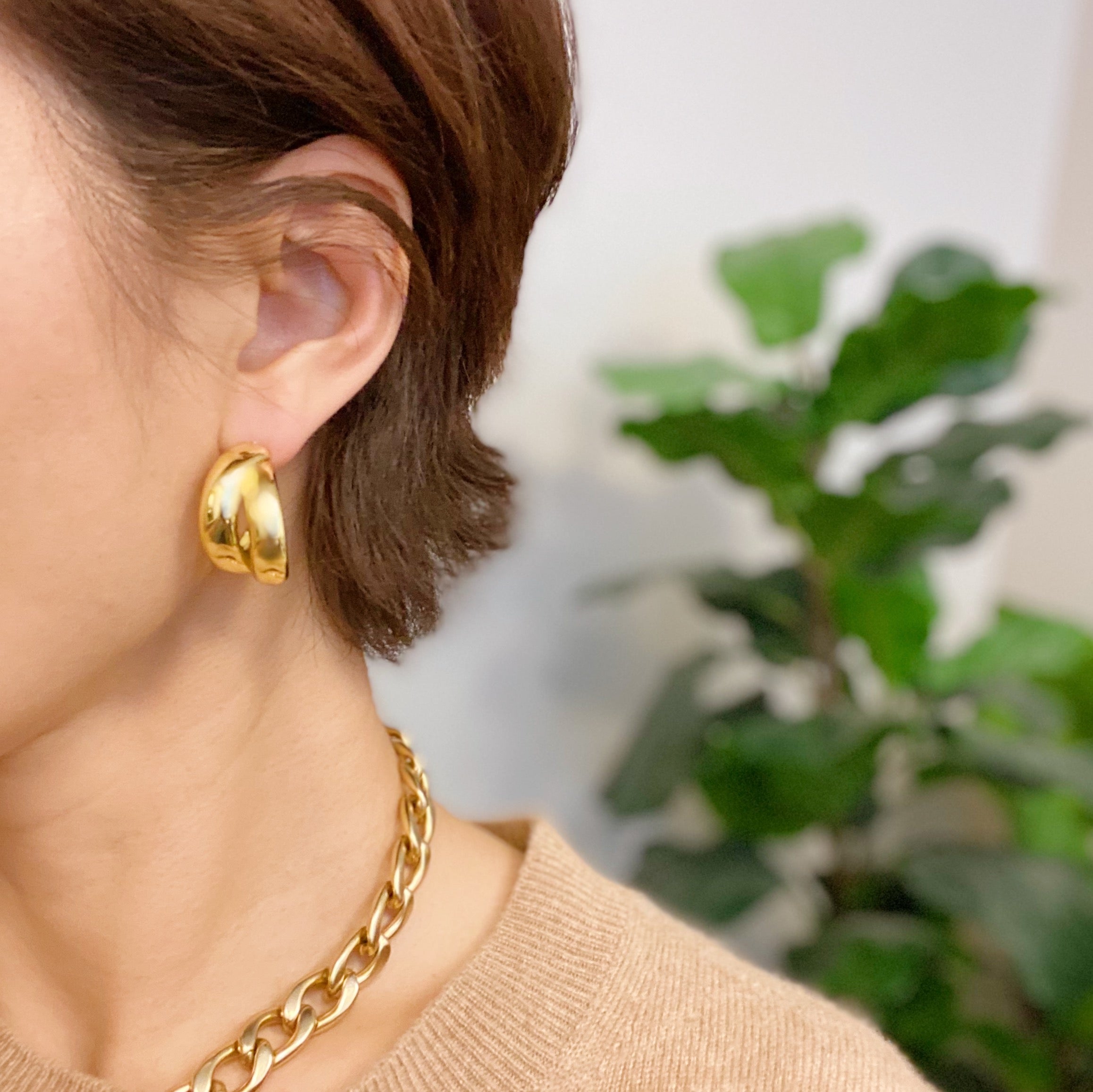 Stylish Lean On Me Hoop Earrings in 18K Gold or Rhodium plated brass, showcasing a chic and edgy design.