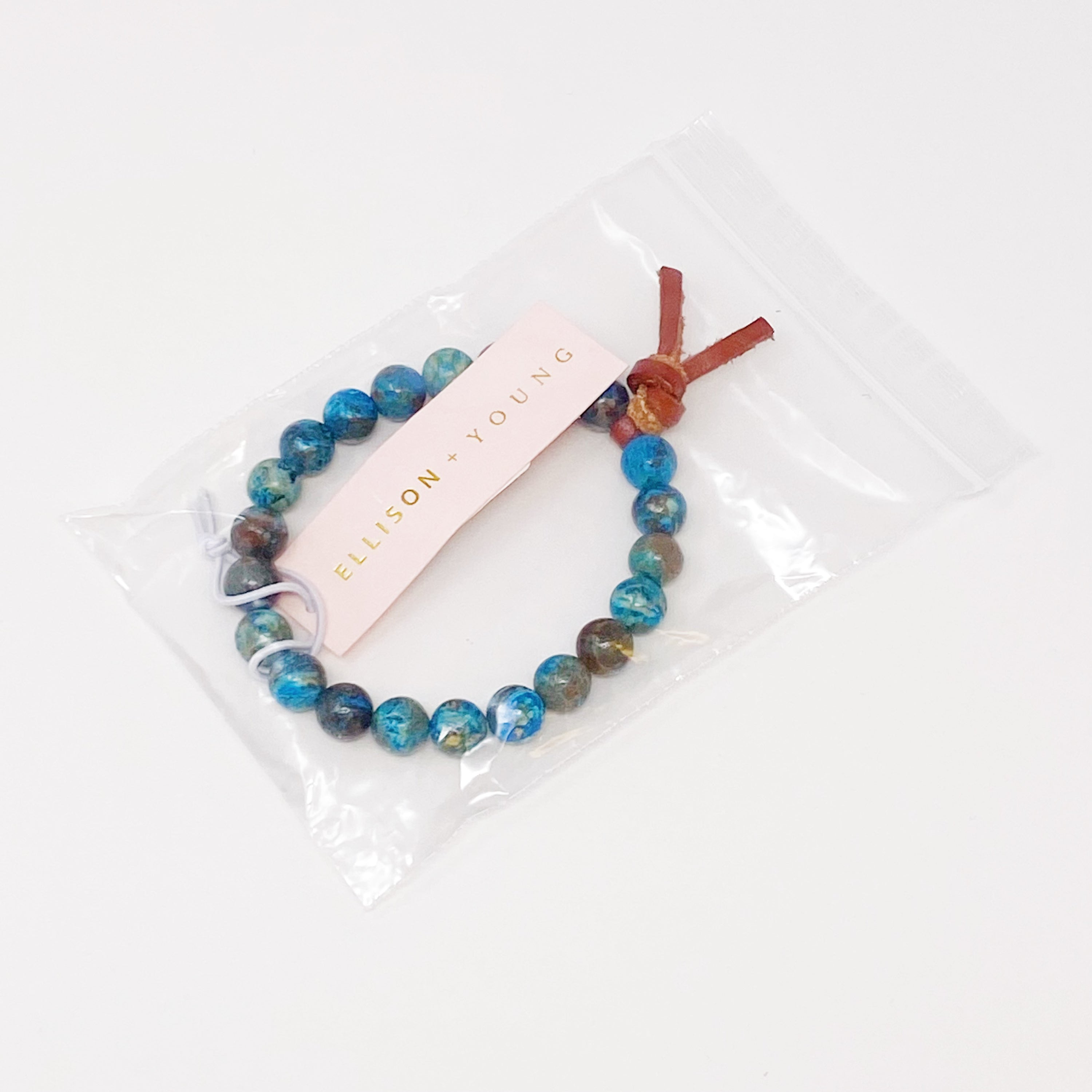 Leather Tie Stone Bracelet featuring blue pattern agate beads and a genuine leather tie, showcasing a boho style.