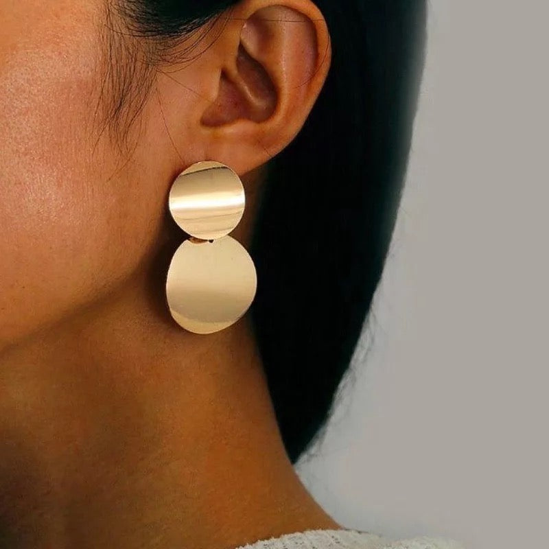 Elegant Leona Drop Earrings featuring a circular design, crafted from 18k gold plated sterling silver.