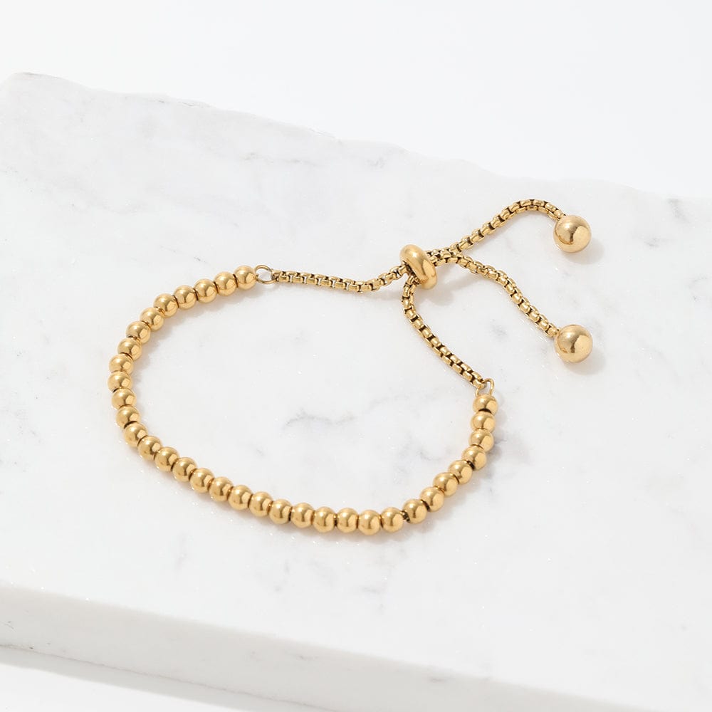 Leonidas Beaded Ball Bracelet featuring a dainty 4mm stainless steel ball chain with 18K gold plating, adjustable length from 15cm to 24cm.