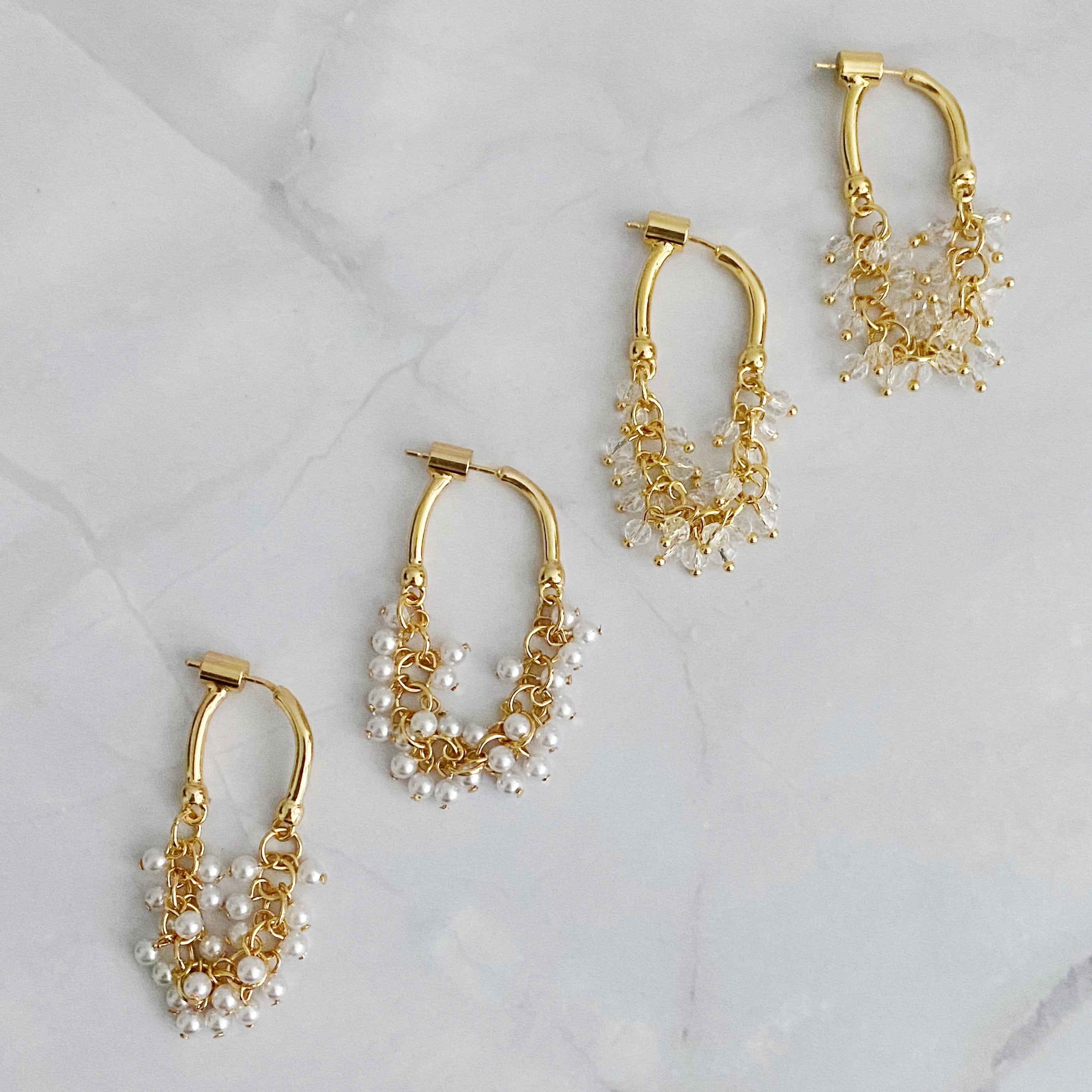 Elegant Let's Wrap It Up Earrings featuring draped beads in gold plating, perfect for any occasion.