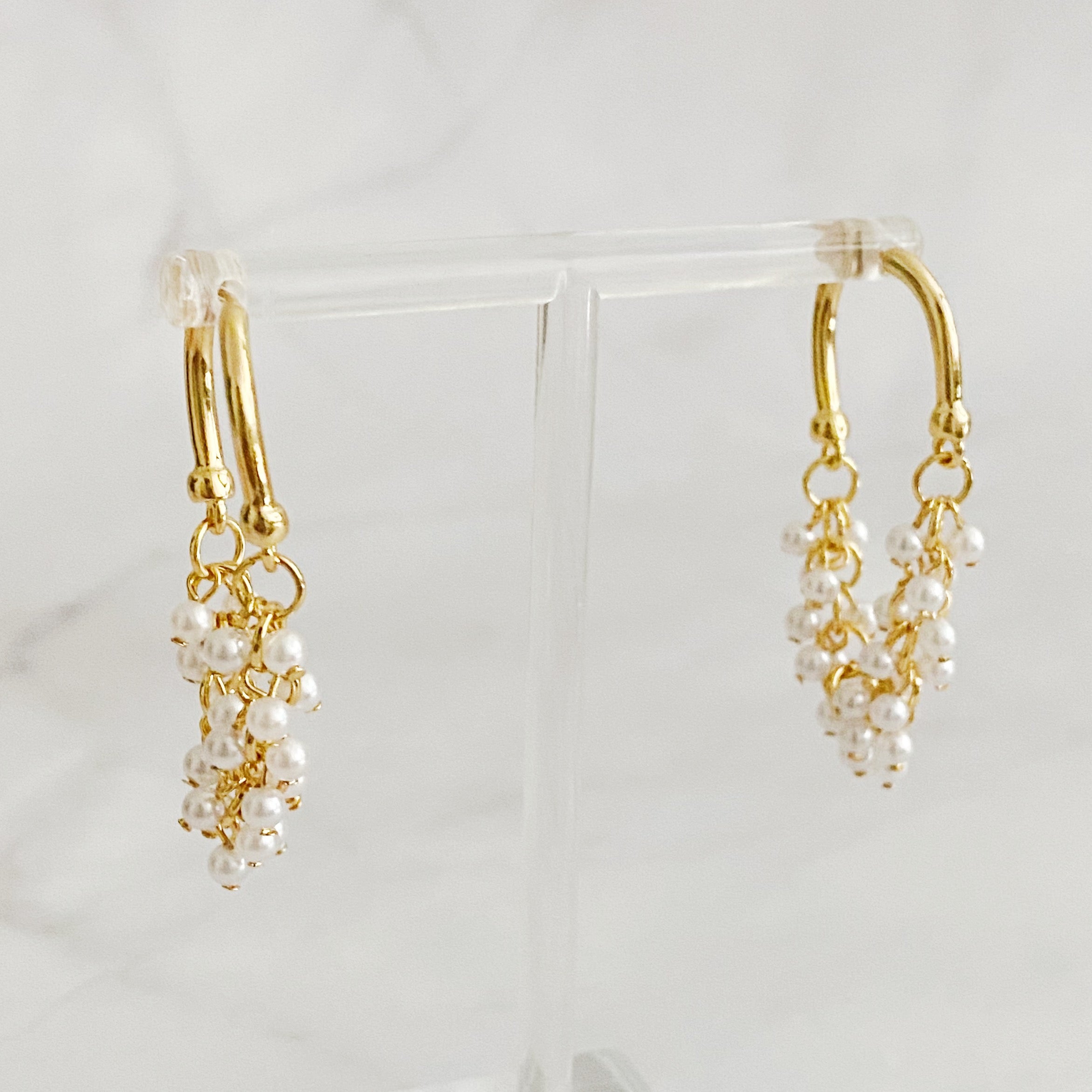 Elegant Let's Wrap It Up Earrings featuring draped beads in gold plating, perfect for any occasion.