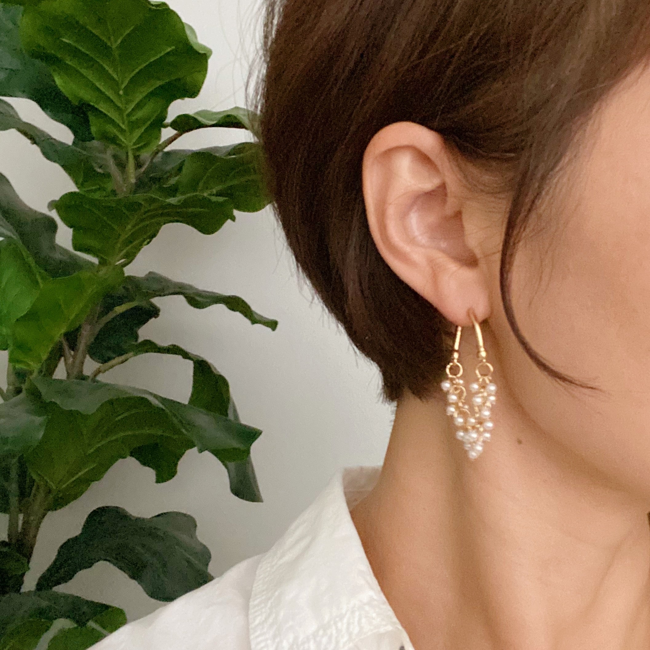 Elegant Let's Wrap It Up Earrings featuring draped beads in gold plating, perfect for any occasion.