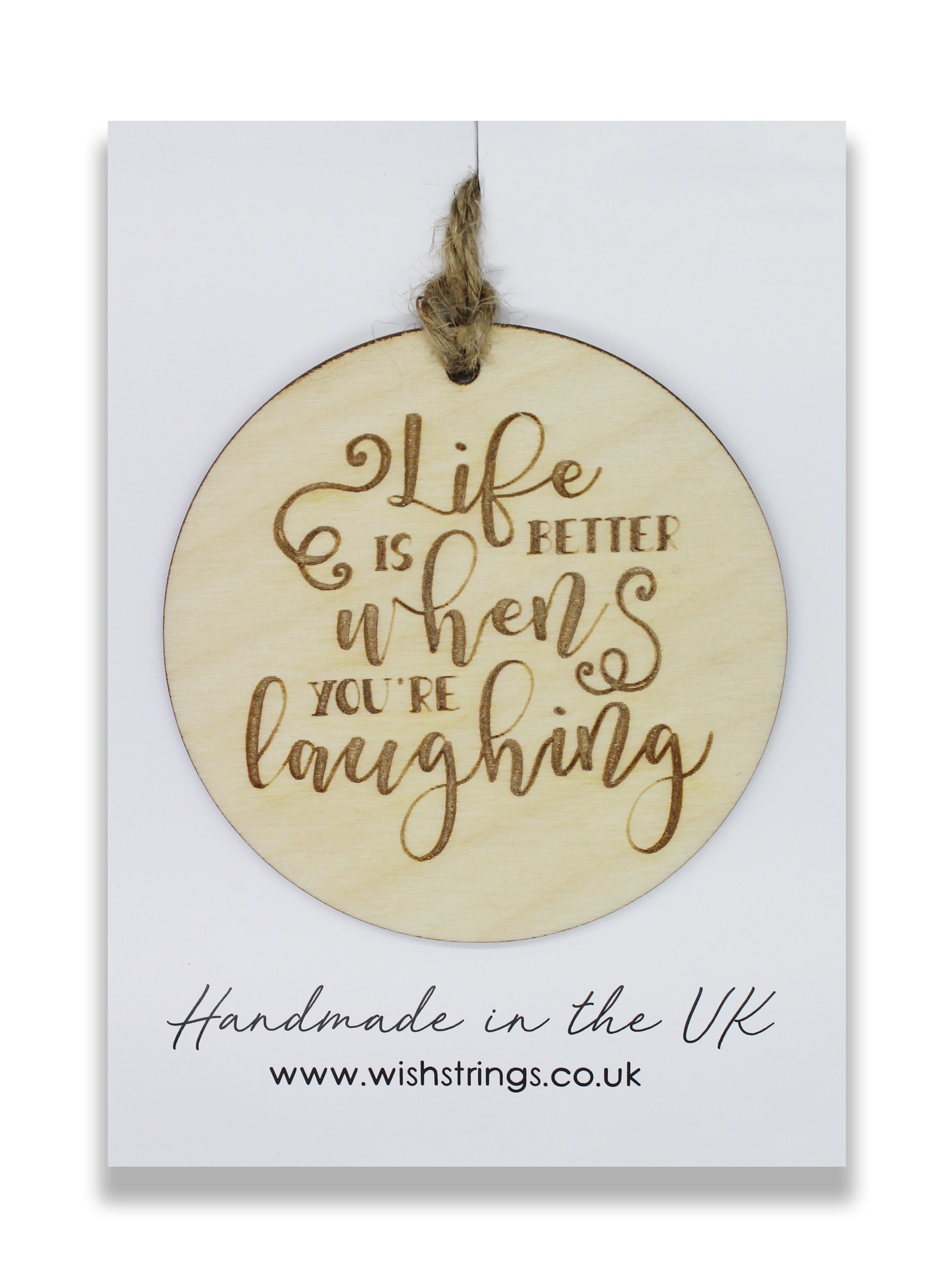 Large wooden hanging decoration with 'LIFE LAUGHING' text, crafted from Birch Plywood, showcasing a smooth finish and intricate design.