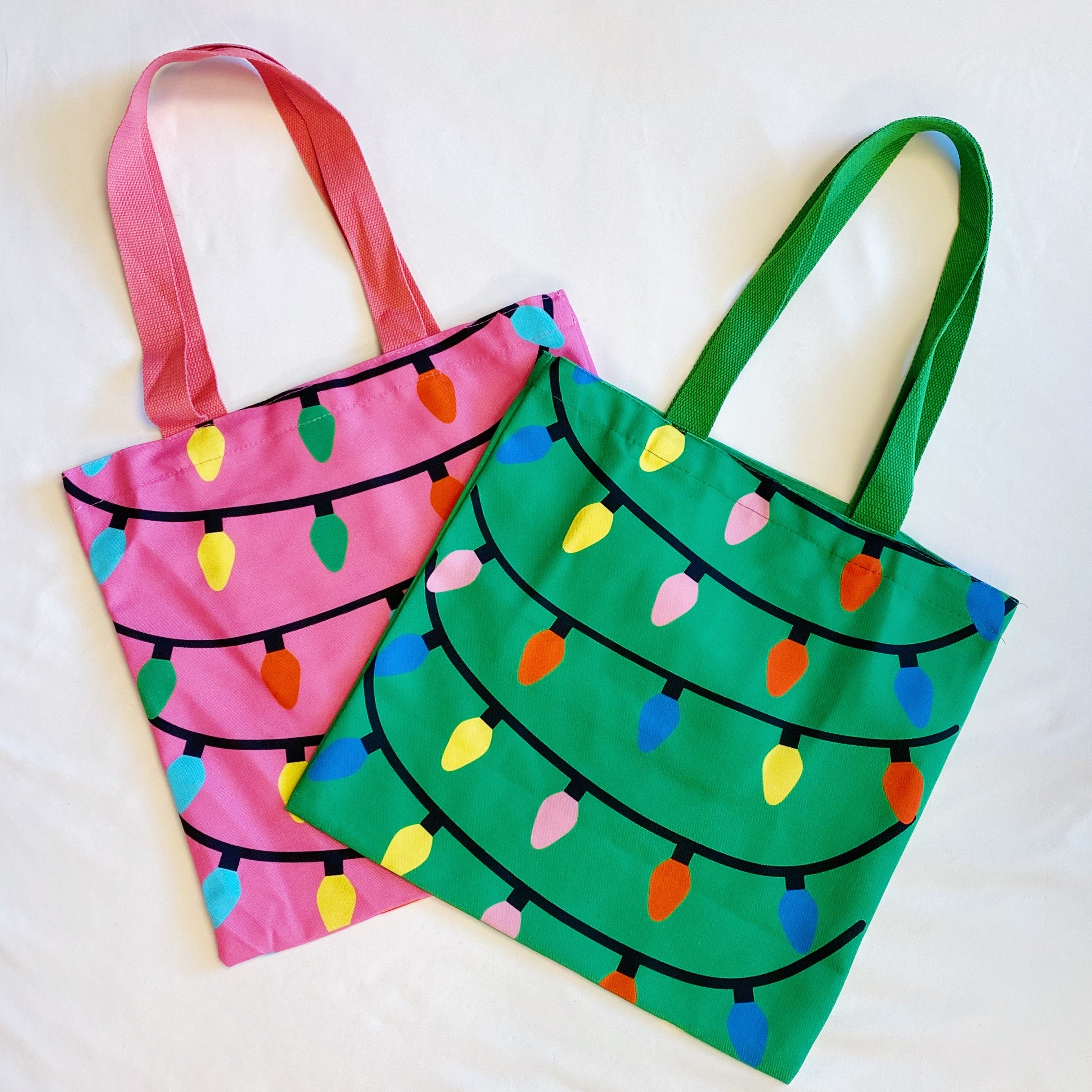 Light Up The Joy Canvas Tote featuring a bright, cheerful design, spacious interior, and durable shoulder straps, perfect for everyday use.