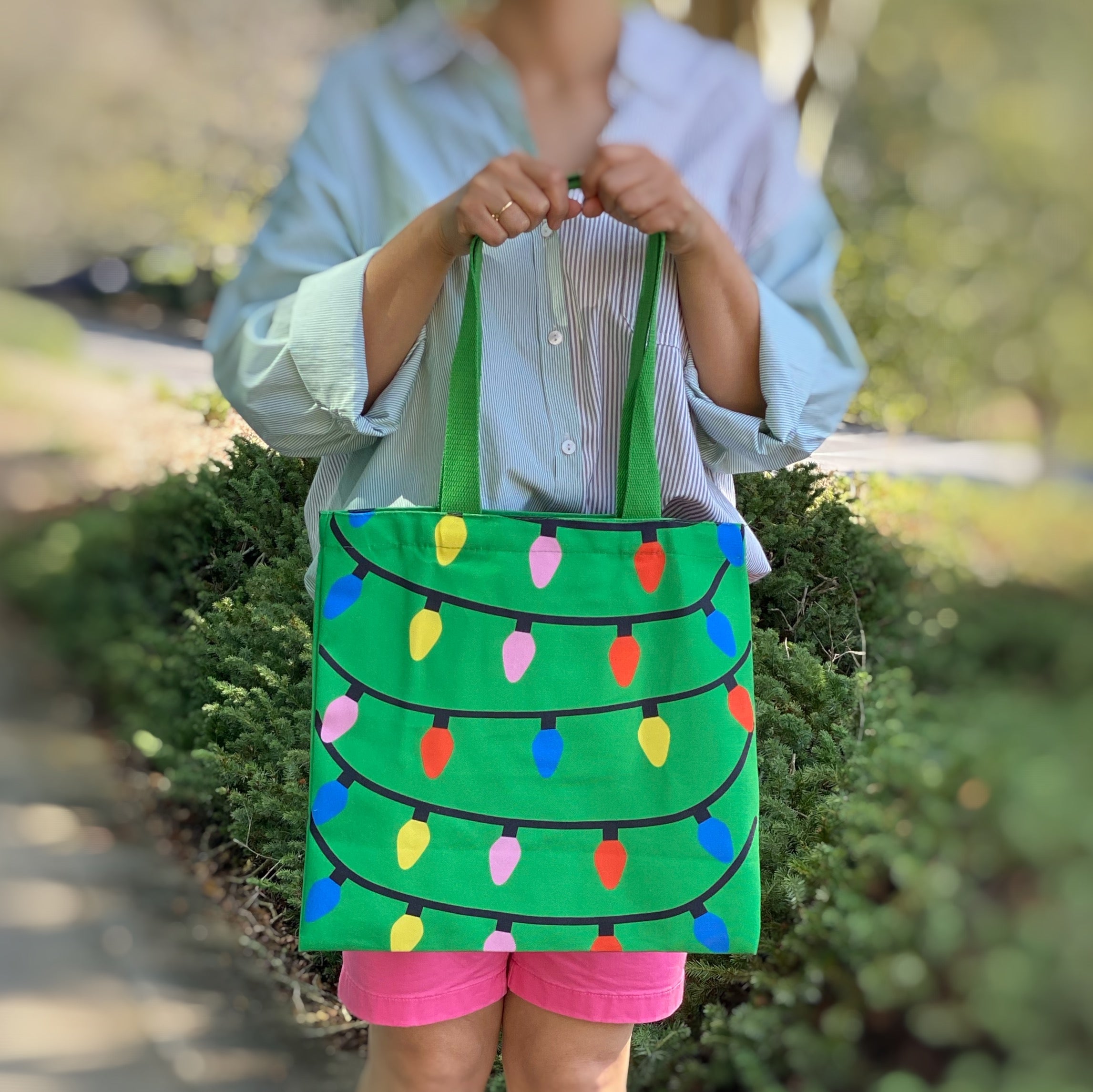 Light Up The Joy Canvas Tote featuring a bright, cheerful design, spacious interior, and durable shoulder straps, perfect for everyday use.