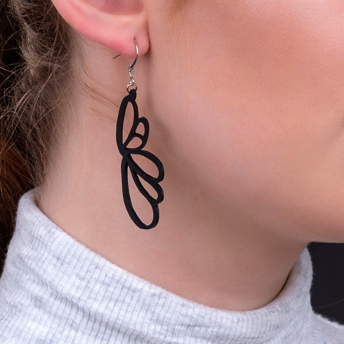 Lilac Upcycled Inner Tube Earrings, handcrafted from reclaimed rubber with silver hooks, showcasing a unique off-centre design.