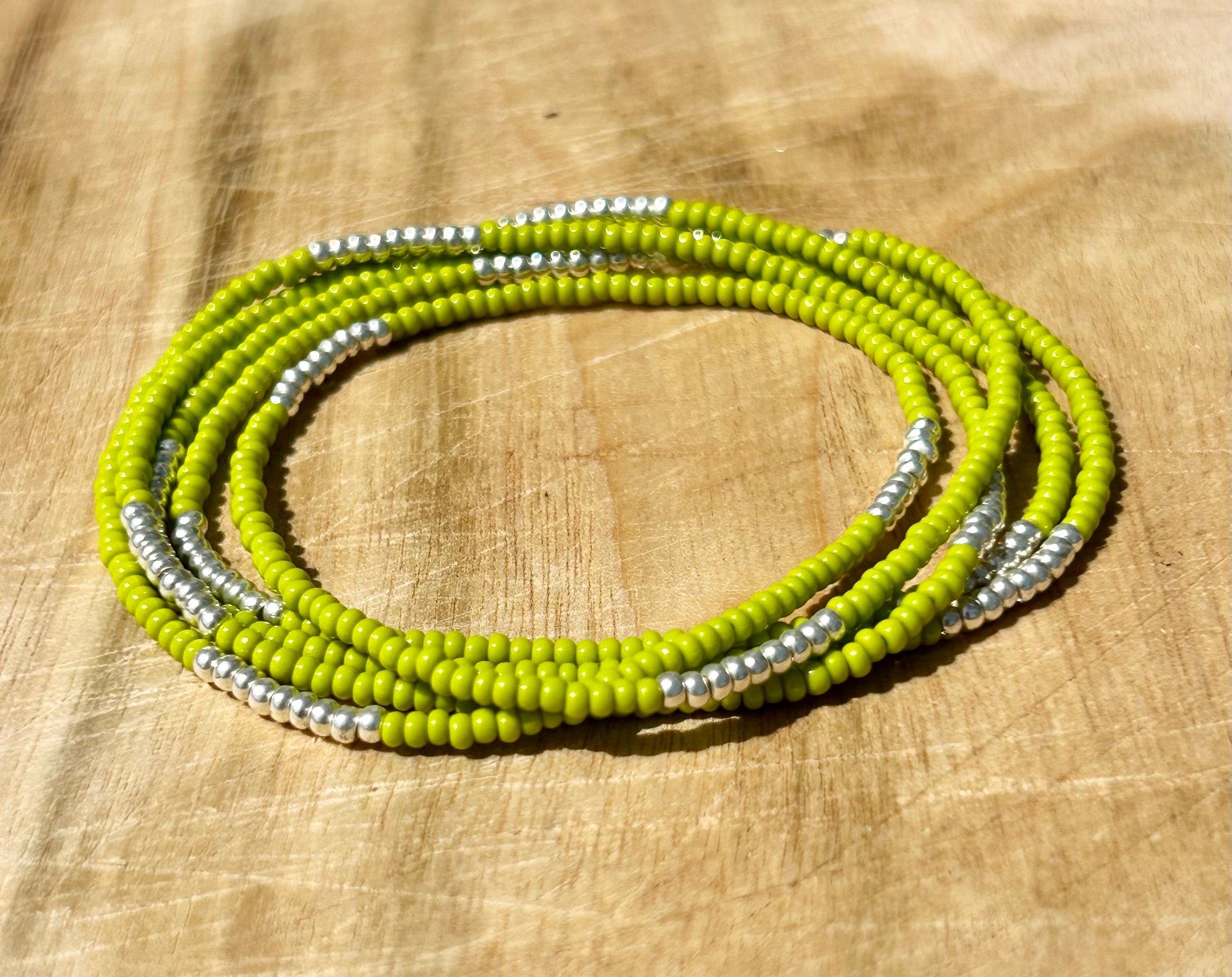 Lime green beaded 5-wrap bracelet with silver stripes, showcasing vibrant Czech glass beads and strong elastic cording.