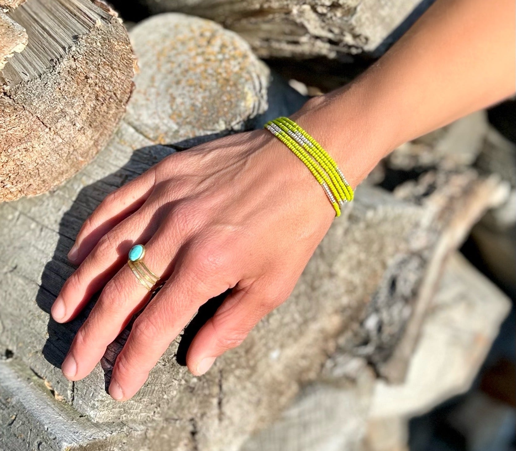 Lime green beaded 5-wrap bracelet with silver stripes, showcasing vibrant Czech glass beads and strong elastic cording.