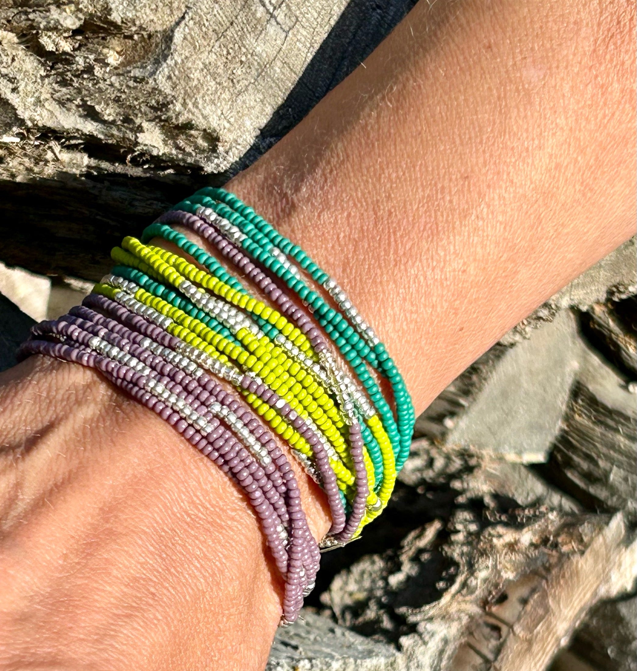 Lime green beaded 5-wrap bracelet with silver stripes, showcasing vibrant Czech glass beads and strong elastic cording.