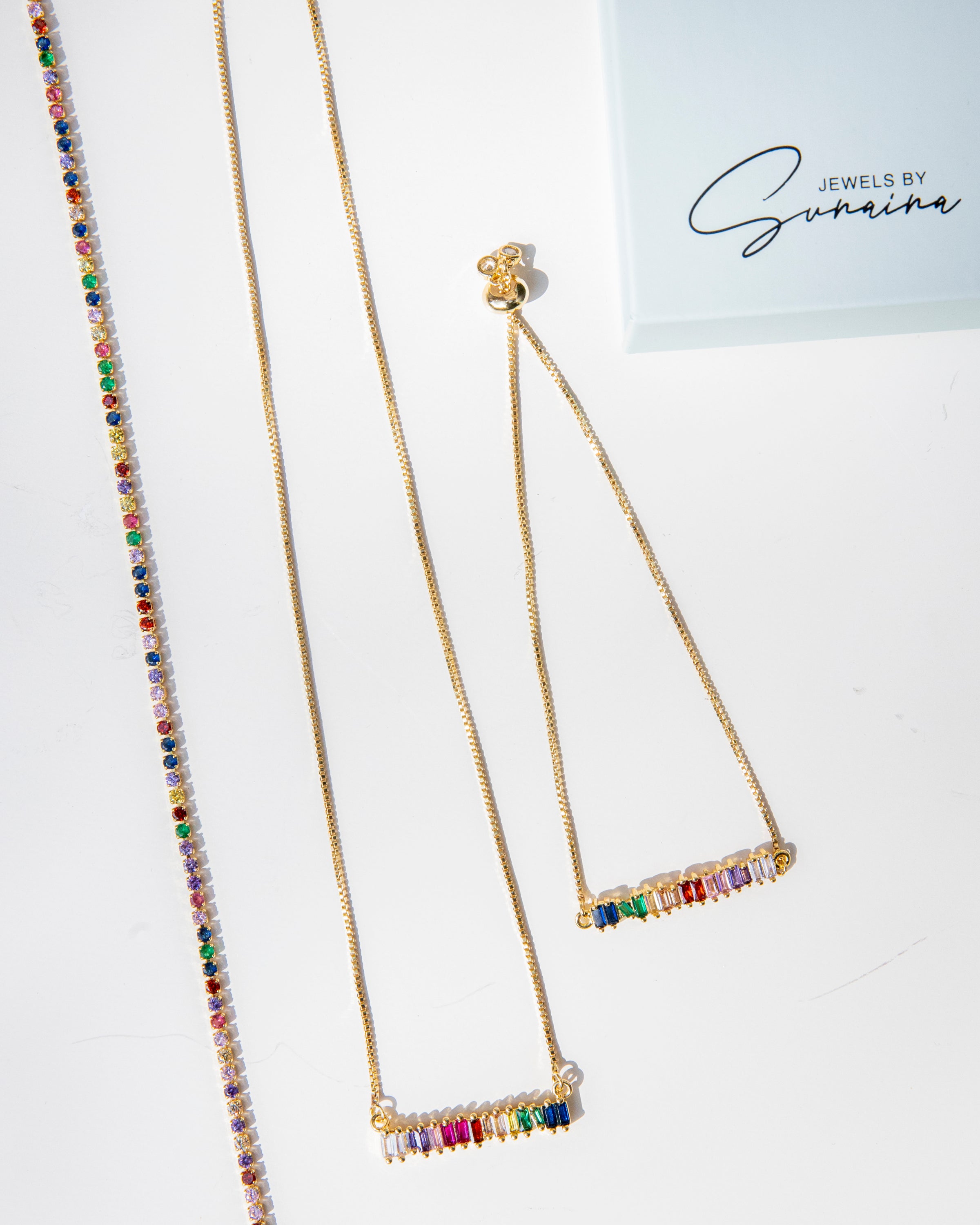 LINDSEY Multi Color Choker featuring vibrant cubic zirconias on a dainty tennis chain, crafted from 925 sterling silver with 18K gold plating.