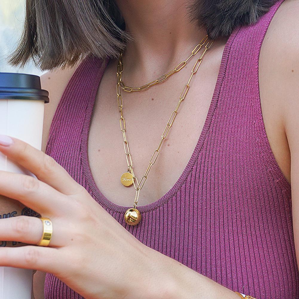 Linear Link Set featuring a ball pendant necklace and a classic CZ band ring in solid 14k yellow gold.