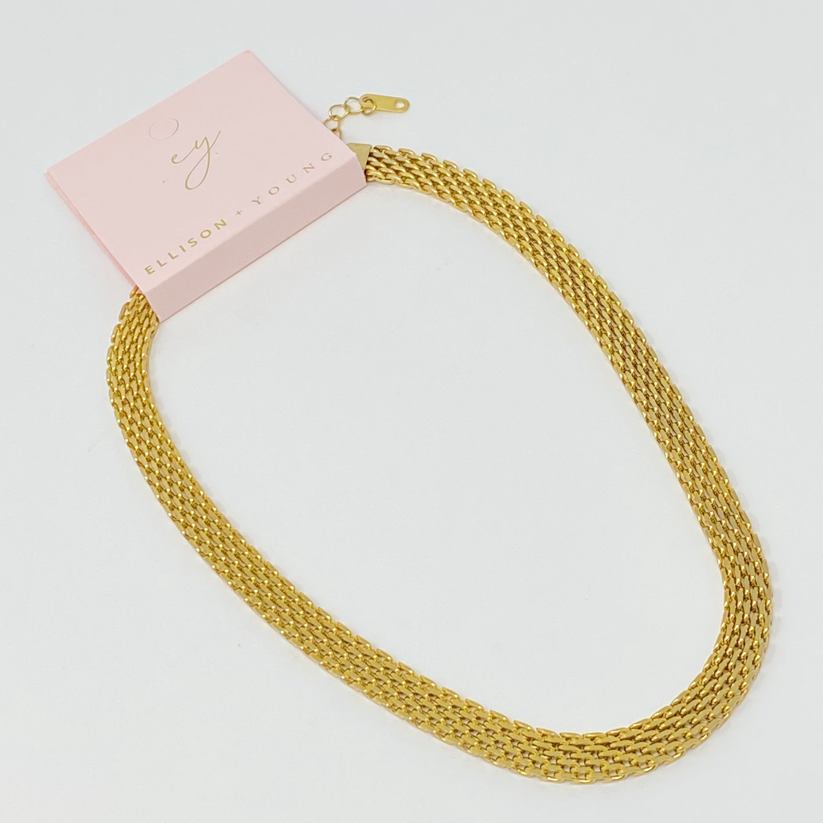 A stylish mesh gold linked necklace with adjustable length, showcasing its elegant design and high-quality finish.