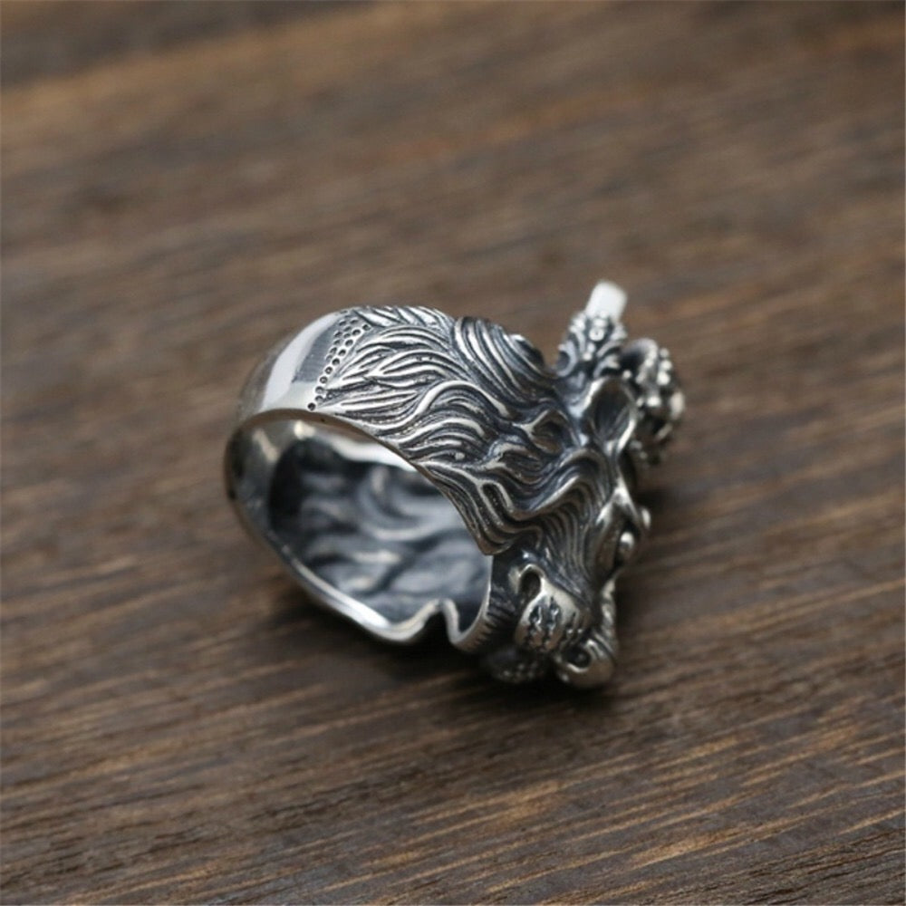 A stunning alloy ring featuring a detailed lion design atop a crown, symbolizing strength and royalty.