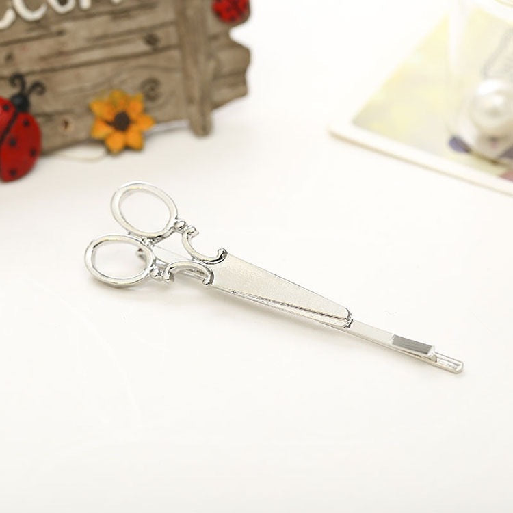 A stylish Little Scissor Hair Pin made of alloy, featuring a unique scissor design, perfect for securing hair in various styles.